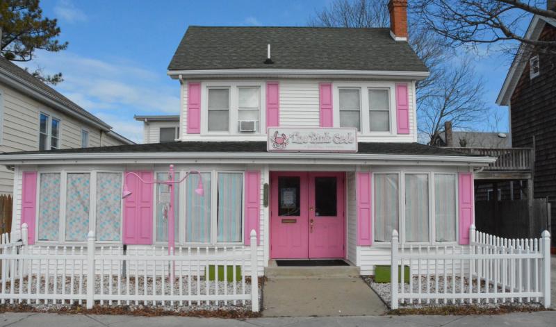 The Pink Crab has retail on the bottom and an apartment on the top.
